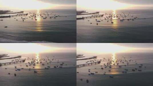 无人机拍摄了日落时停泊在码头旁的船只。在利马的乔里洛斯区，高清在线视频素材下载