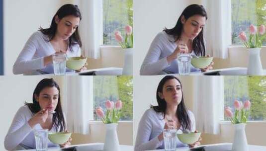 美丽的女人在吃早餐高清在线视频素材下载