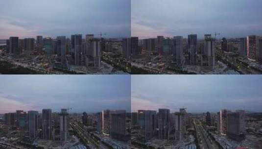 福建泉州东海新区CBD高楼建筑夜幕降临航拍高清在线视频素材下载
