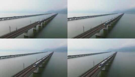 高铁驶过城市跨江大桥高清在线视频素材下载
