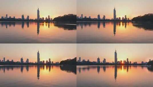 南京黄昏玄武湖拍摄紫峰大厦高清在线视频素材下载