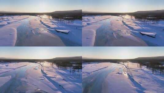 夕阳下内蒙古北方不冻河平静水面雪雾袅袅高清在线视频素材下载