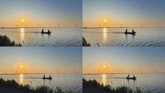 夕阳下湖面渔船剪影高清在线视频素材下载