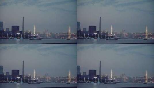 4k上海傍晚日落后面的南浦大桥卢浦大桥夜景高清在线视频素材下载