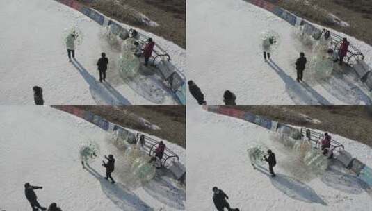 雪地里玩翻转气球的人群DLOG高清在线视频素材下载