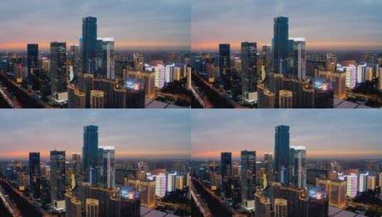 西安地标高新都市之门写字楼航拍夕阳夜景高清在线视频素材下载