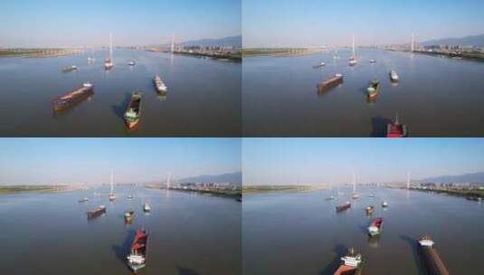 航拍蓝天下长江上来来往往的船舶高清在线视频素材下载
