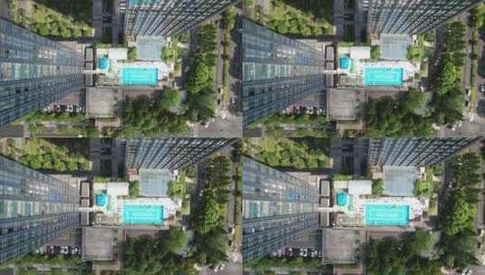 现代办公大楼室外游泳池航拍高清在线视频素材下载