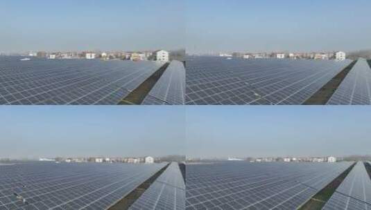 农村太阳能光伏发电站低角度航拍视频高清在线视频素材下载