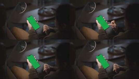 女性使用绿色绿幕抠像替换屏幕手机高清在线视频素材下载