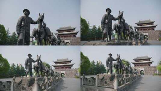腾冲文星楼前的马帮雕像高清在线视频素材下载