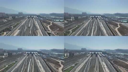 航拍一列高速列车驶出庐山站高清在线视频素材下载