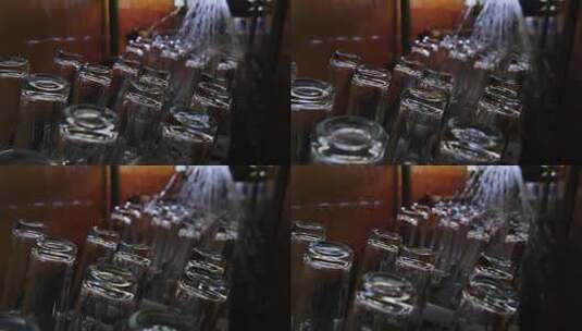 玻璃瓶化妆瓶制造水洗工艺高清在线视频素材下载