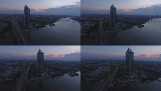 泰国KBank总部和拉玛九世大桥城市夜景航拍高清在线视频素材下载