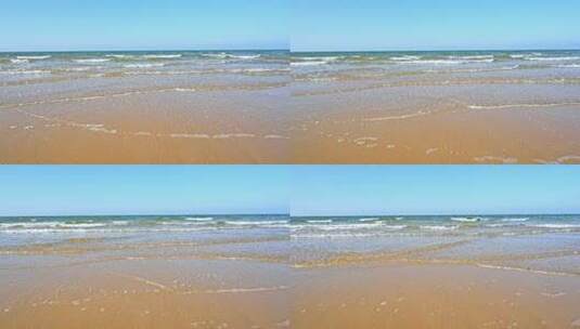夏天的海边海滩上波浪泛起朵朵浪花慢镜高清在线视频素材下载