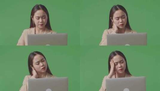 亚洲女人不满意的特写镜头，在绿屏上使用笔记本电脑时摇摇头高清在线视频素材下载