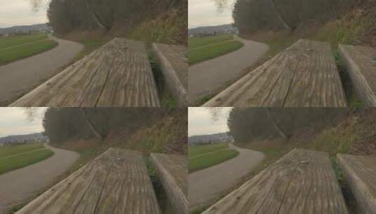 沿着山路旁的一条木凳高清在线视频素材下载