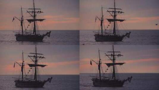 一艘高大的快艇在日落时航行高清在线视频素材下载