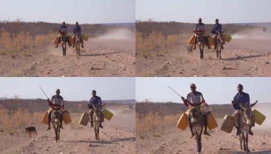 辛巴族男子骑着驴给偏远村庄送水高清在线视频素材下载