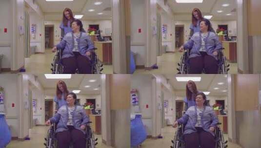 护士推着坐着轮椅的病人高清在线视频素材下载