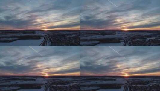 冬季平原傍晚落日夕阳飞机飞过航拍高清在线视频素材下载