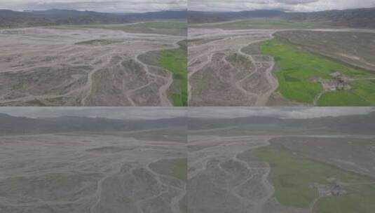 航拍西藏藏区湿地中的农田田地高清在线视频素材下载