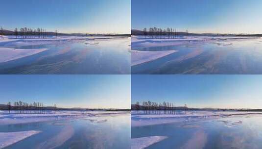 夕阳下内蒙古北方不冻河平静水面雪雾袅袅高清在线视频素材下载