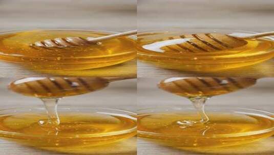 玻璃碗里的蜂蜜滴落高清在线视频素材下载