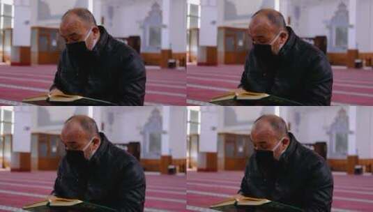 男士阅读古兰经高清在线视频素材下载
