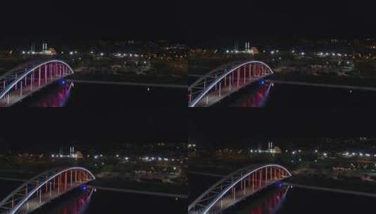 夜晚沿着一座桥的霓虹灯高清在线视频素材下载
