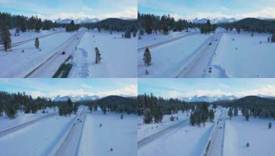 航拍汽车在积雪覆盖的山路上缓慢行驶高清在线视频素材下载