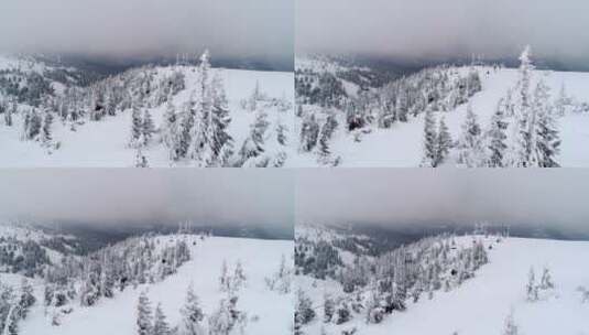 紧挨着山区的滑雪场飞行_高清在线视频素材下载