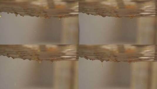 新鲜蜂蜜过滤流动特写高清在线视频素材下载