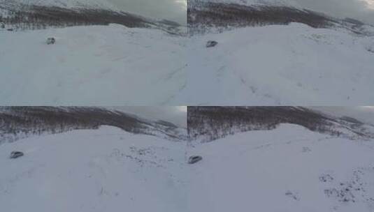 在雪山上行驶的车辆高清在线视频素材下载