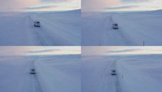 在雪路上行驶的汽车高清在线视频素材下载