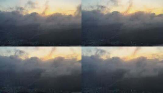 朦胧的晚霞云雾下的城市高清在线视频素材下载