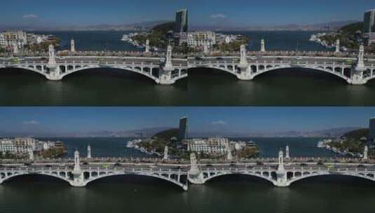 大理洱海上的兴盛大桥航拍高清在线视频素材下载