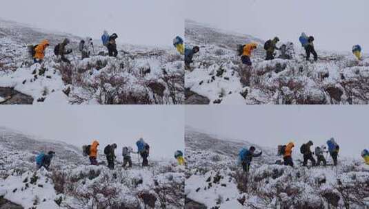 攀登岷山山脉都日峰的登山者在雪中徒步行进高清在线视频素材下载