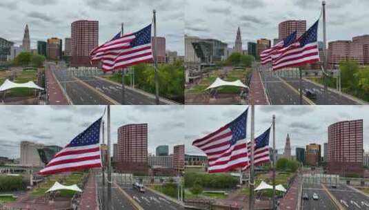 哈特福德康涅狄格州的天际线。空中飘扬的美国国旗。康涅狄格河上的桥。高清在线视频素材下载