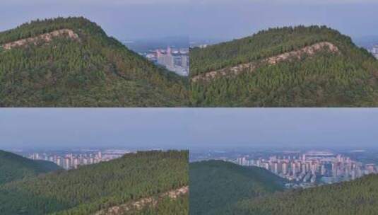 航拍枣庄袁寨山后面的城市高清在线视频素材下载