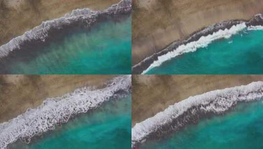 沙滩和海浪冲击俯瞰视角的高清在线视频素材下载