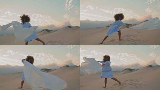 沙漠夏日雾霾中舞者表演飘动的布高清在线视频素材下载