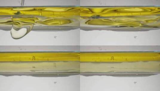 往水中倒入食用油高清在线视频素材下载