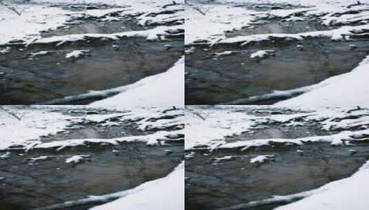 落满雪花的小溪高清在线视频素材下载