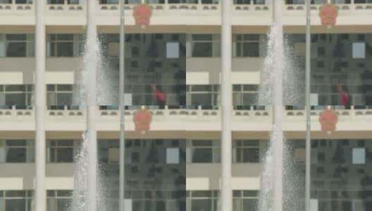 建筑楼房前的喷水池高清在线视频素材下载