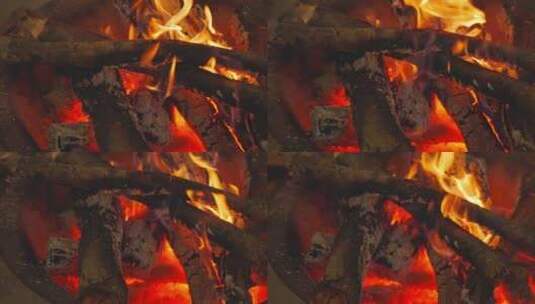 燃烧的火焰火堆木材木炭慢动作升格高清在线视频素材下载