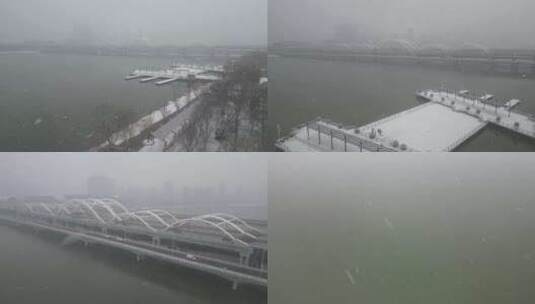 西安浐灞大雪广运潭大桥雪景下雪航拍高清在线视频素材下载