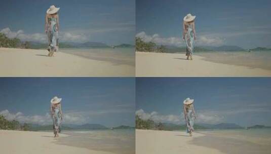 4K-完美身材的女孩光脚走在沙滩上的背影高清在线视频素材下载