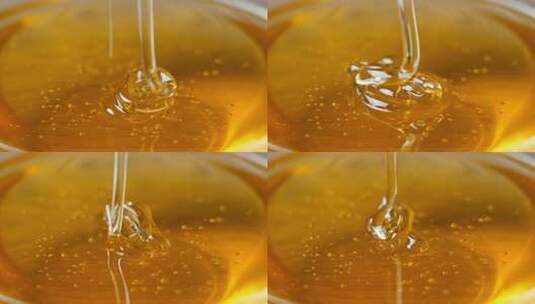 蜂蜜滴落特写高清在线视频素材下载