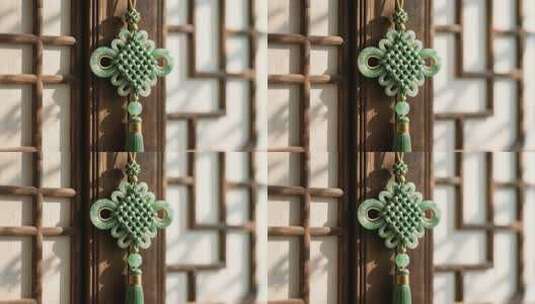 中式木窗上的翡翠中国结挂件高清在线视频素材下载